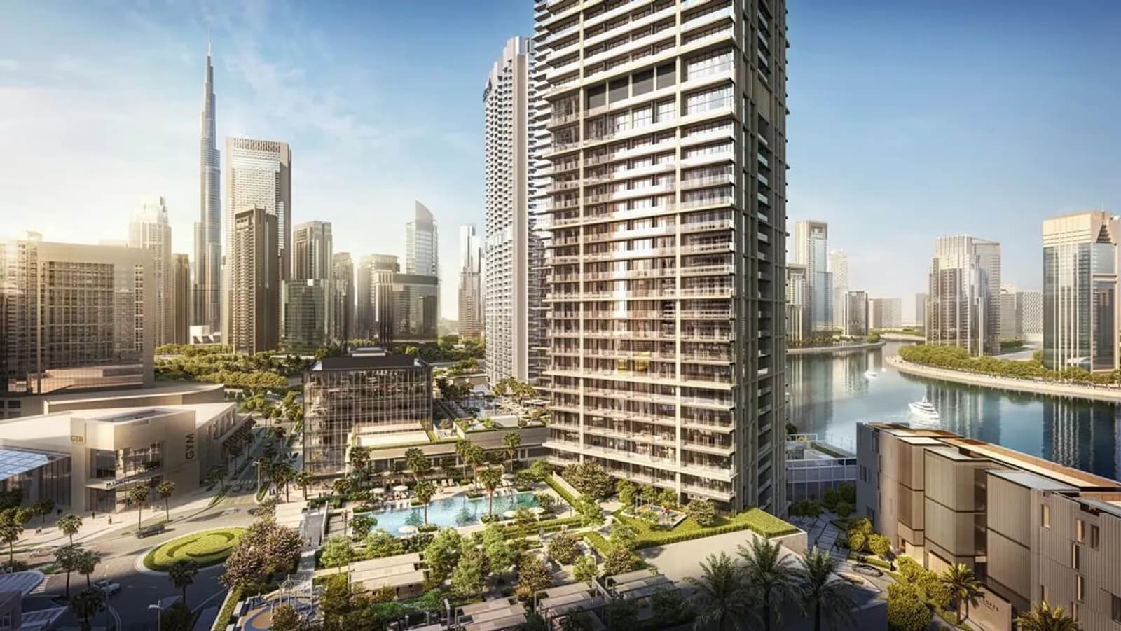 Peninsula Four towers on the Dubai Canal in Business Bay, with the Burj Khalifa behind