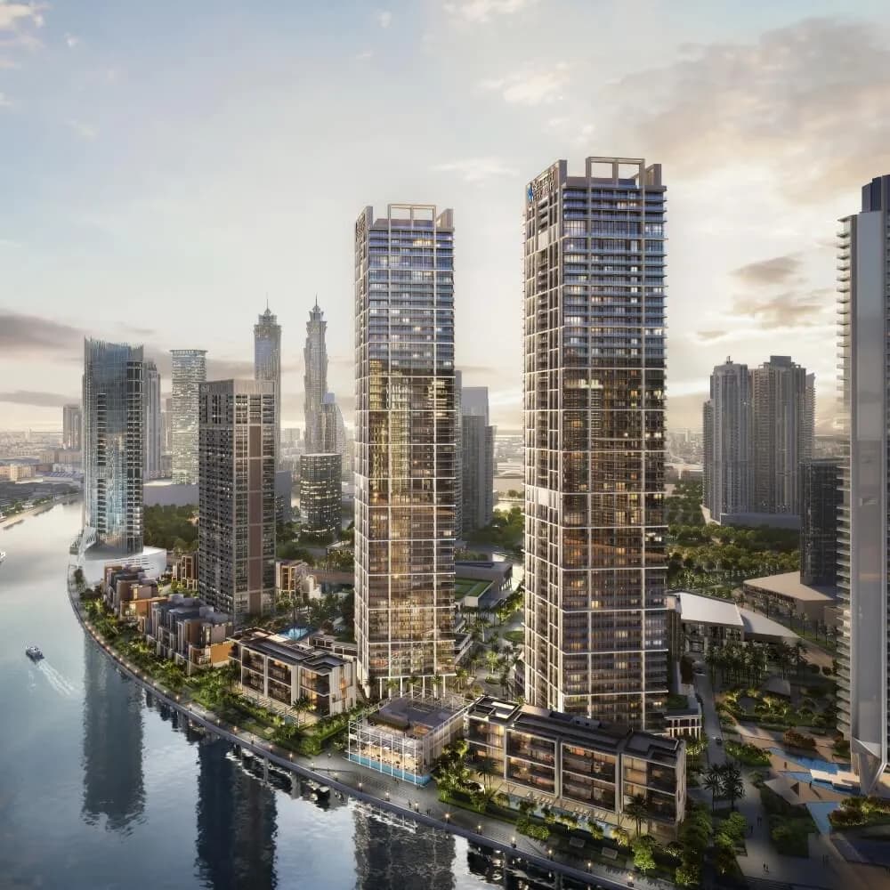 Peninsula Four's twin towers above the Dubai Canal