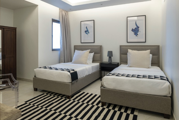 Deluxe Three Bedroom + Maids Room